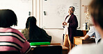Happy woman, teacher or students with whiteboard for science lesson, education or learning in class. Female person, educator or lecturer with smile or group of learners for teaching in classroom