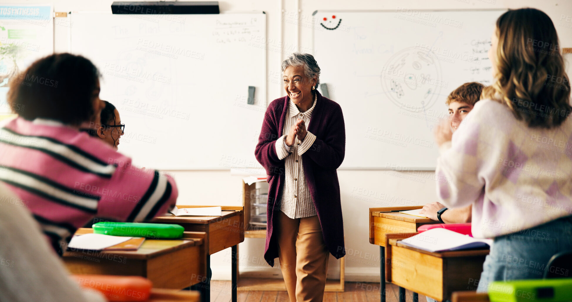 Buy stock photo Teacher, children and happy with applause in classroom for goals, excited or celebration for test results. Mature woman, pupil and smile with success, clapping hands and achievement at high school