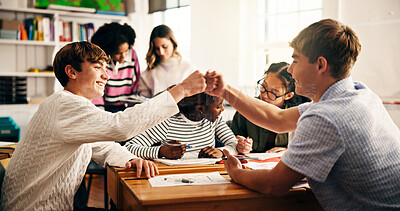 Buy stock photo Education, team and student in classroom with fist bump, success and collaboration in creative work. Smile, fun and scholar in art room with stationary, achievement and support for group activity.