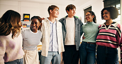 Buy stock photo Education, happy or group of students hug in classroom, friends bonding or ready for team project. Learning, diversity or teenagers smile in academy with solidarity, social support or study in school