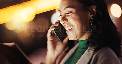 Buy stock photo Happy, woman and phone call with tablet at night for discussion, planning and deadline for proofreading. Bokeh, journalist and mobile to contact editor, interview agenda and overtime for publication