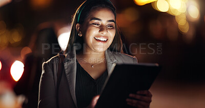 Buy stock photo Woman, tablet and happy in city at night, scroll or booking taxi for commute on business trip. Person, tech and chat in town, bokeh and notification with smile, app and social network in Colombia