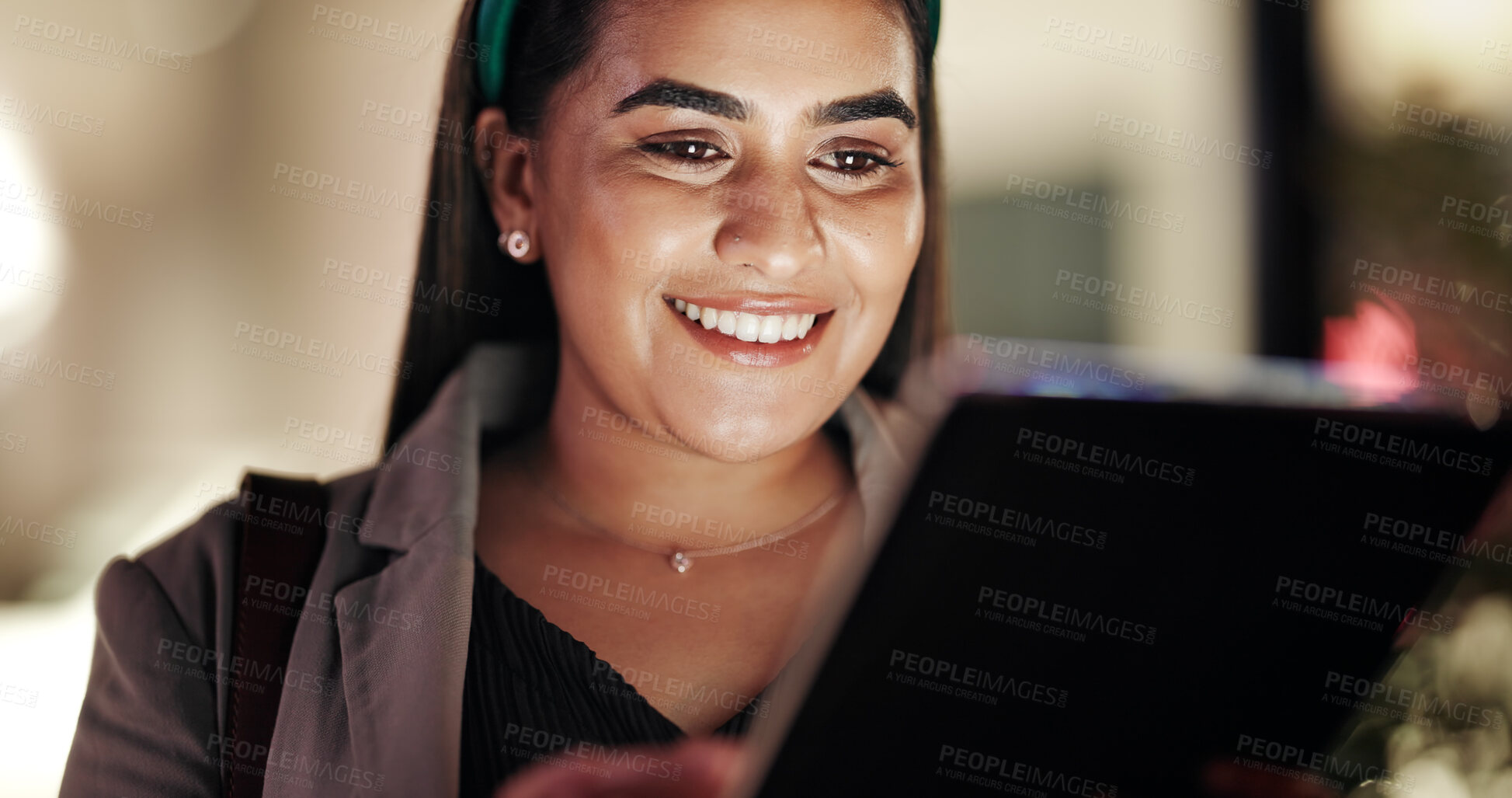 Buy stock photo Tablet, night and business woman in office for working late, online proposal and project deadline. Happy, corporate and person on tech in dark for reading report, website and research with bokeh