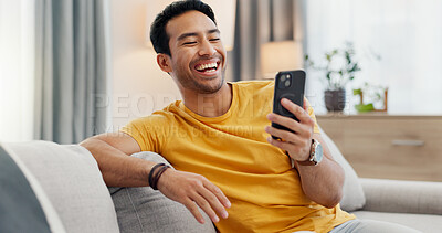 Buy stock photo Laugh, video call and man on sofa with phone for connection, social networking and online chat. Relax, home and person on smartphone for communication, internet and funny conversation on mobile app