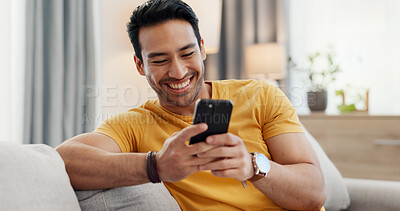 Buy stock photo Mobile, relax and happy man in home for internet, social media post and reading news. Cellphone, living room and person with app for online text, communication and check message with notification