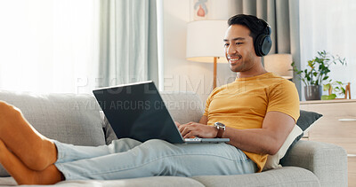Buy stock photo Calm, headphones and laptop with man on sofa for streaming service, film website and comfortable. Movie subscription, watching series and entertainment with person in living room of home for search