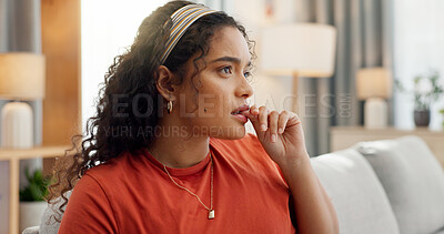 Buy stock photo Anxiety, biting nails and woman with stress, thinking and nervous on sofa in living room with worry. Mental health, fear and student in home frustrated with issue, fail or mistake with tension habit