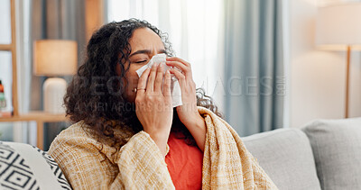 Buy stock photo Sick, woman and blow nose in home for winter allergies, cold disease and virus infection. Flu, tissue paper and person in living room on sofa with blanket, bacteria and health problem with hay fever