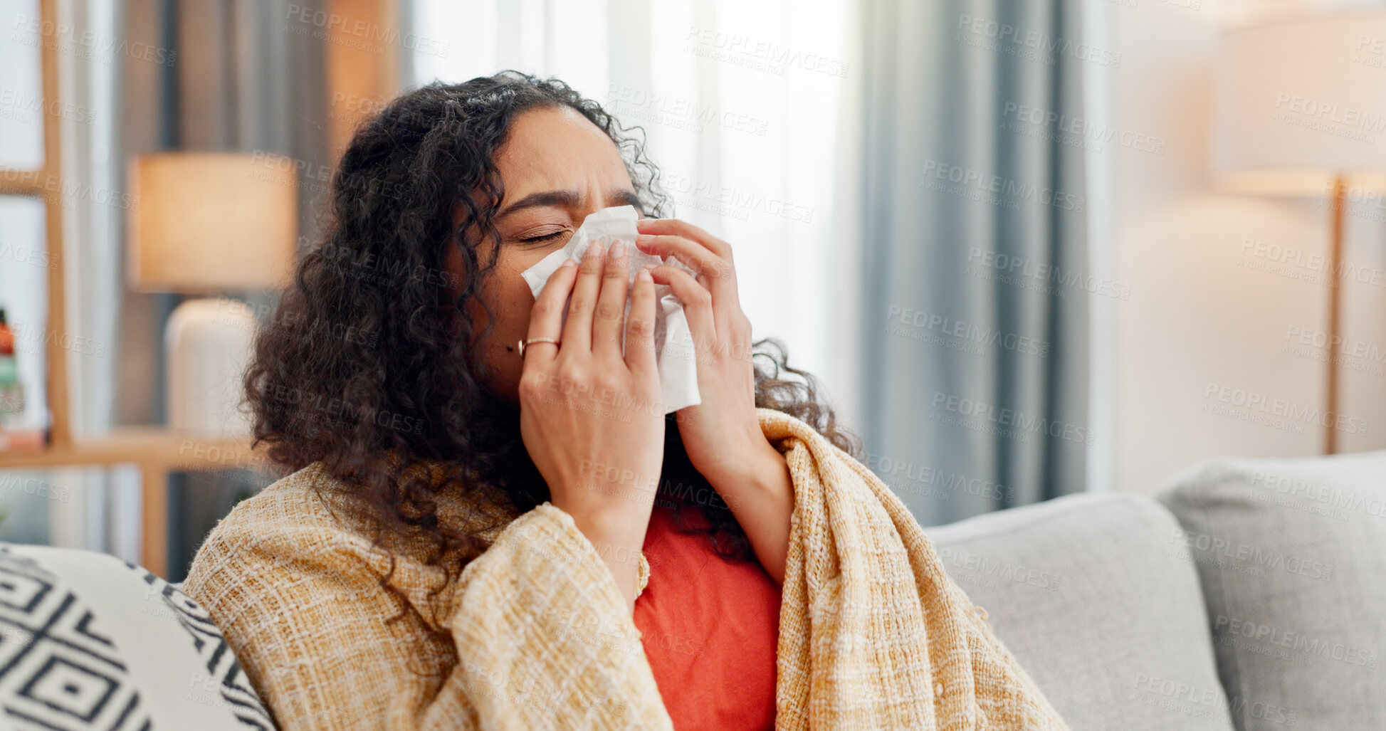 Buy stock photo Sick, woman and blow nose in home for winter allergies, cold disease and virus infection. Flu, tissue paper and person in living room on sofa with blanket, bacteria and health problem with hay fever