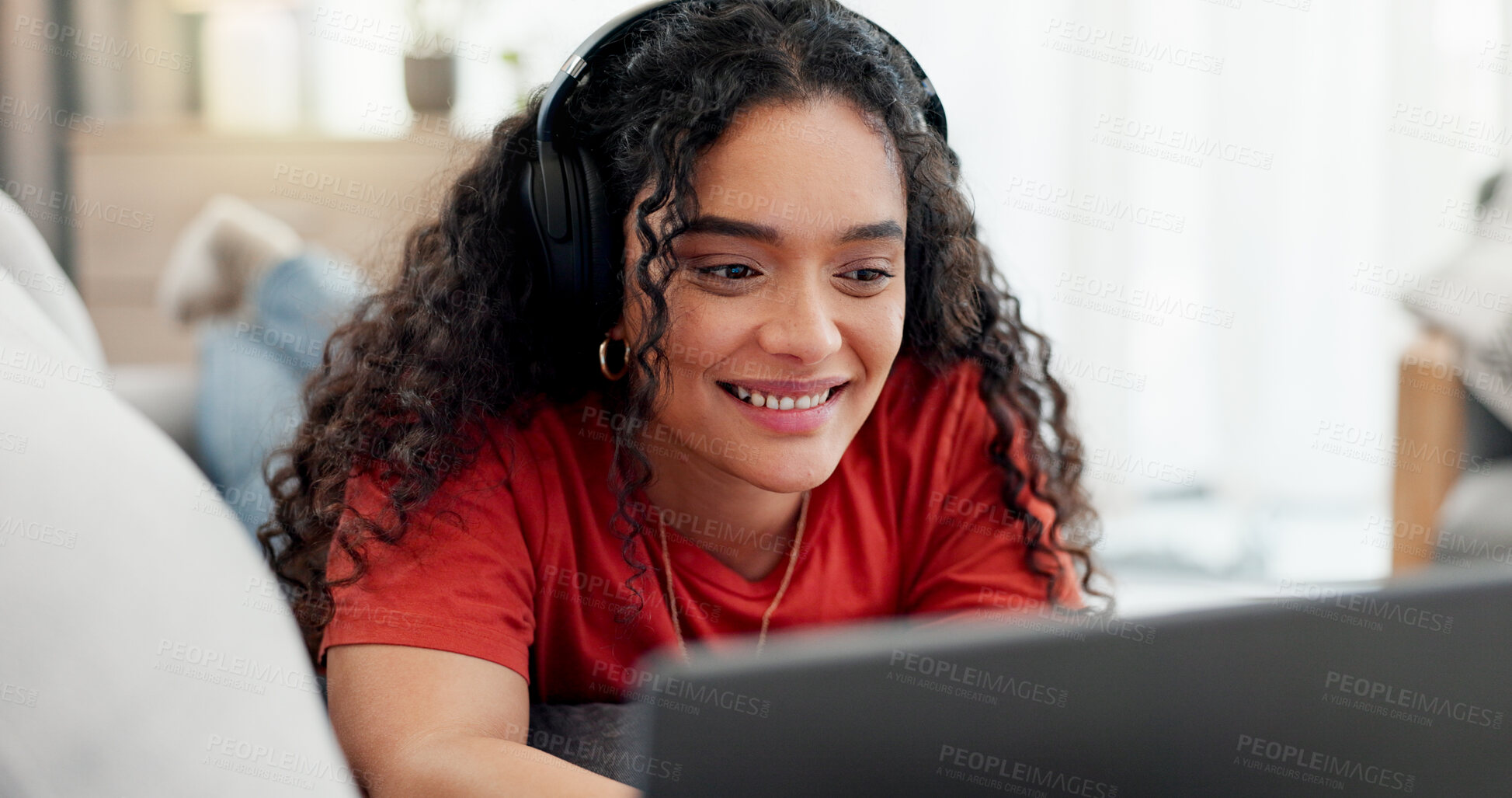 Buy stock photo Woman, laptop and headphones on sofa for movie, social media and video streaming or website in home. Relax, internet audio and female person on couch with technology, break and watching film on app