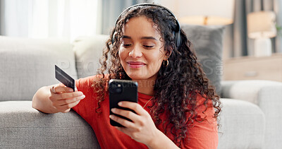 Buy stock photo Woman, phone and credit card in living room for purchase, online shopping or banking in home. Female person, student and smile with technology for bank app, ecommerce and payment or subscription