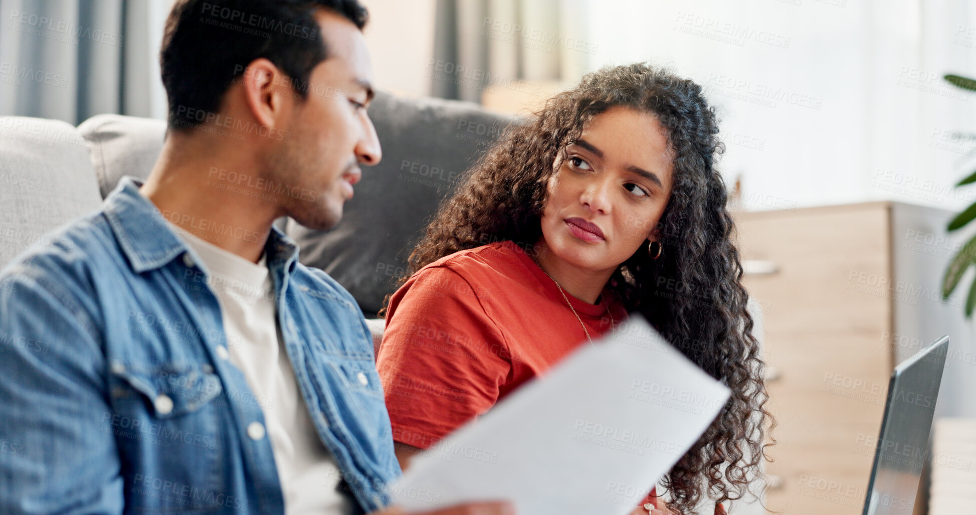 Buy stock photo Serious, couple and talking with document at house for finance planning, payment error and bankruptcy. People, listening and laptop for loan paperwork, budget mistake and worry for home repossession