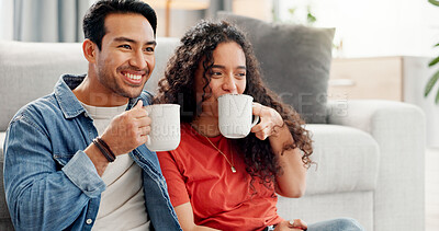 Buy stock photo Happy, sofa and couple in home with coffee for bonding, connection and relationship on weekend. Dating, apartment and man with woman with drink, beverage and rest for love, conversation and romance