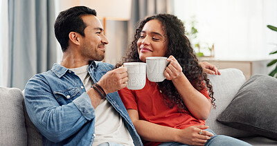 Buy stock photo Relax, sofa and couple cheers with coffee for bonding, connection and relationship on weekend. Dating, home and happy man and woman with drink, beverage and rest for love, conversation and romance