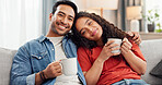 Happy, coffee and portrait of couple on sofa in home with relax, calm or peaceful morning together. Smile, cappuccino and man with woman for hug, bonding or connection in marriage in living room.