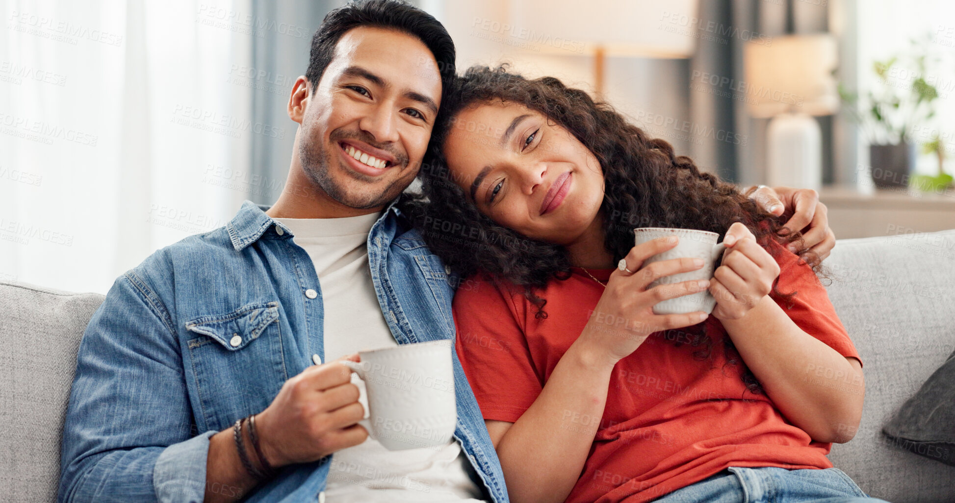 Buy stock photo Happy, coffee and portrait of couple on sofa in home with relax, calm or peaceful morning together. Smile, cappuccino and man with woman for hug, bonding or connection in marriage in living room.