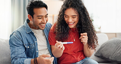 Buy stock photo Pregnancy test, happy and couple on sofa excited for fertility success, results and parenting news. Relationship, pregnant and man with woman celebrate with medical kit for ivf treatment or ovulation