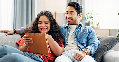 Buy stock photo Couple, relax and happy with tablet on sofa for internet browsing, online shopping or app sign up. Bonding, people and smile with tech in home for streaming service and social media update on weekend