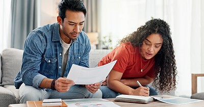 Buy stock photo Couple, writing and reading document at house for financial planning, review budget and bills invoice. People, paperwork and application for home insurance, mortgage expenses and reminder for payment