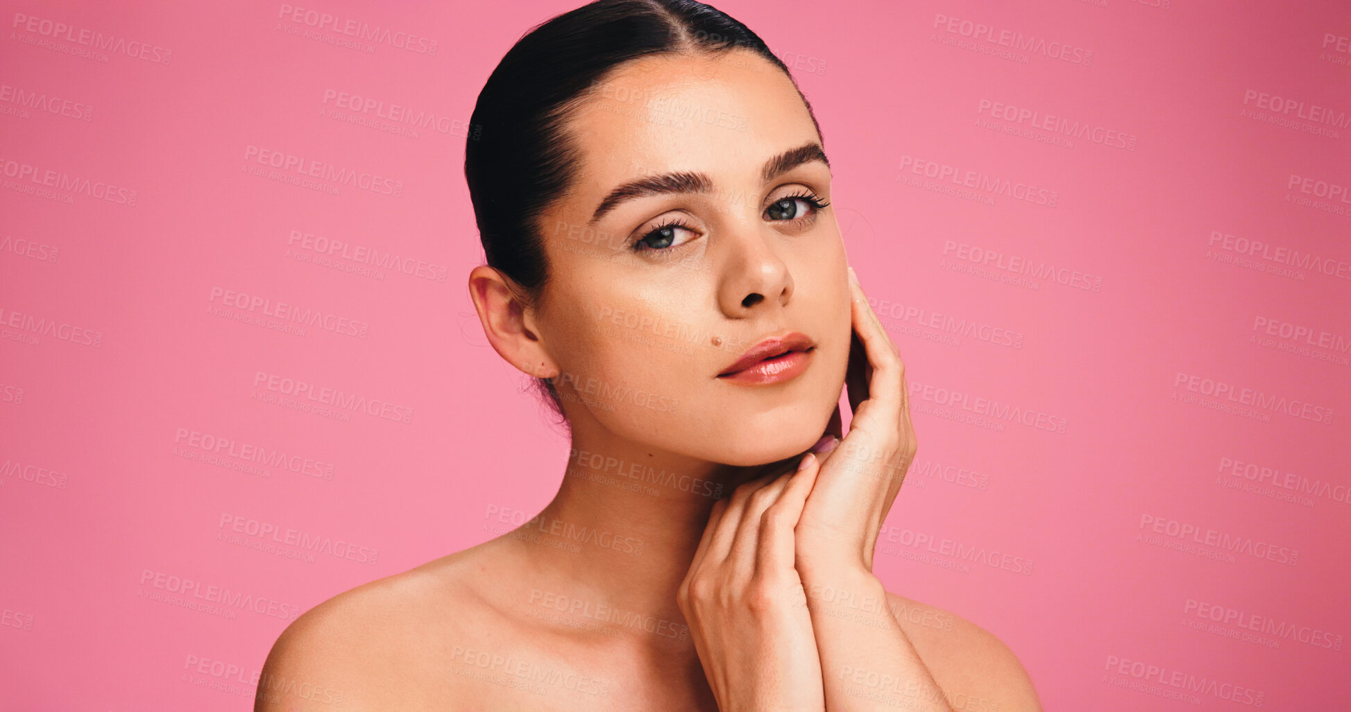 Buy stock photo Skincare, natural and portrait of woman in studio with beauty, cosmetics or facial glow. Serious, mockup space and female person from Brazil with face dermatology for wellness by pink background.