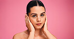 Skincare, glow and portrait of woman in studio with natural, cosmetics or facial beauty. Serious, confident and female person from Brazil with face dermatology for wellness by pink background.
