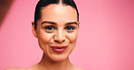 Portrait, selfie and woman in studio for skincare, beauty and glow on pink background mockup space. Photo, smile or model with cosmetics for lipstick makeup, face or influencer with social media POV