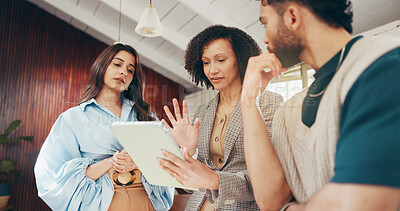 Buy stock photo Business, team or meeting with tablet in office for guest list review, venue discussion or planning. Event planner, people or below with tech for vendor management, online reservation or client email