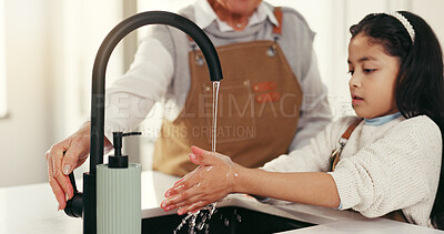 Buy stock photo Support, mother and child washing hands in home, teaching health and wellness practice for hygiene education. Helping, parent and girl in kitchen, bacteria and germ removal in cleaning dirt at faucet