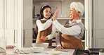 Happy grandmother, grandchild and high five in kitchen for baking success or dessert recipe in home. Grandma, grandkid and smile with ingredients or apron for culinary art, skill or learning together