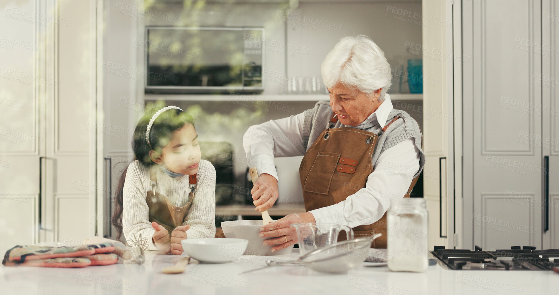 Buy stock photo Girl, grandmother and learning with cooking in kitchen, window and stir with bonding at home. People, grandma and child for teaching, baking or support with attention, guide and food at family house