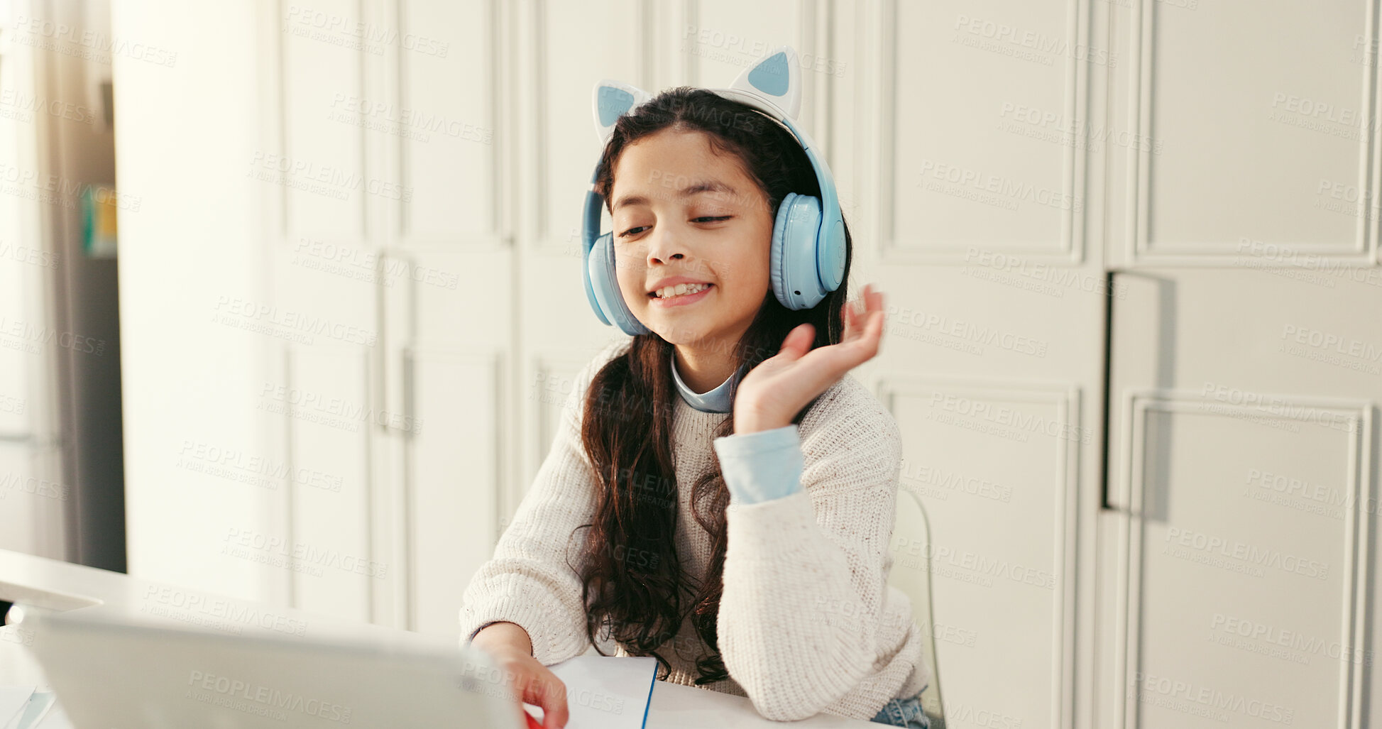 Buy stock photo Girl, e learning and video call with wave, tablet or happy with headphones in virtual class at home. Kid, pupil and smile with tech, app and hello for education, online course or development at house