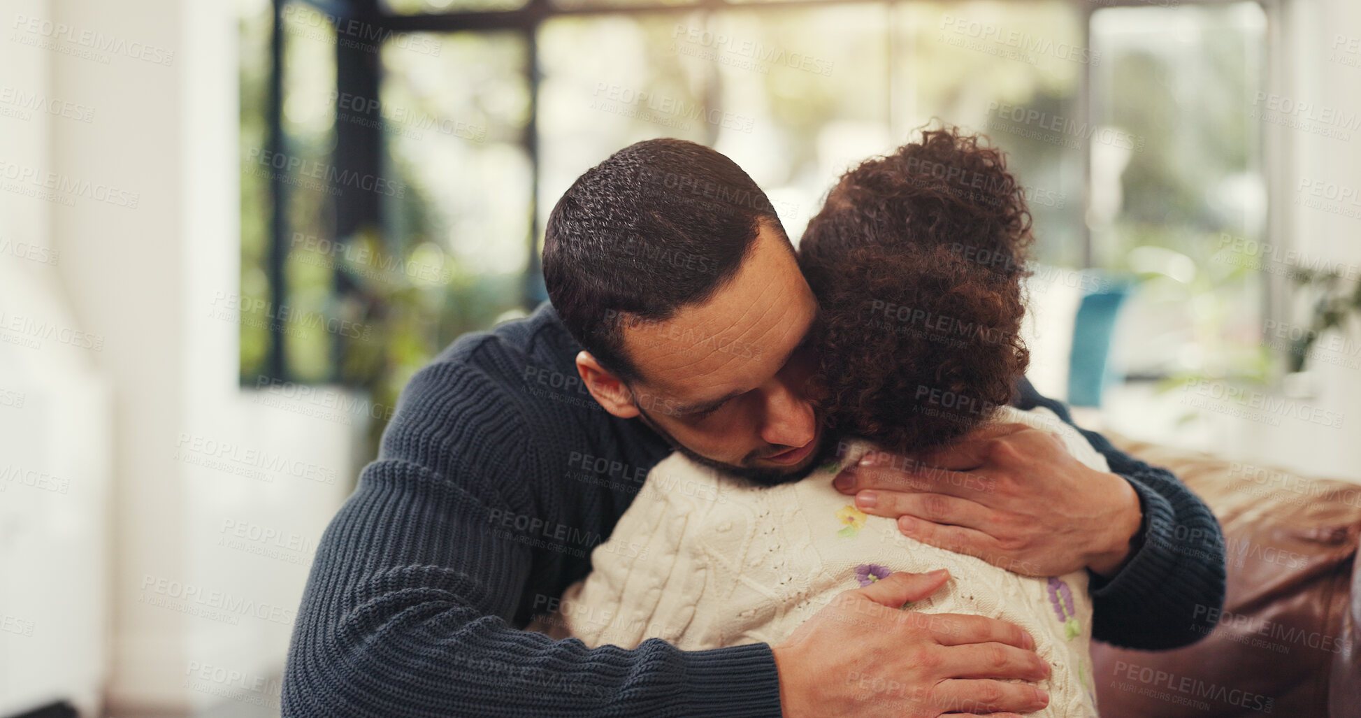 Buy stock photo Home, hug and dad with child on sofa for bonding, relationship and support in living room. Family, parenting and father with girl embrace for affection, care and love on couch for comfort and safety