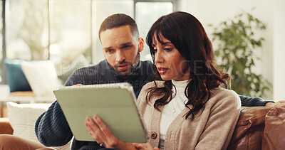 Buy stock photo Research, tablet and couple with discussion in home for virtual shopping, buy or decision. Digital technology, man and woman in lounge for planning, internet purchase or check credit score online