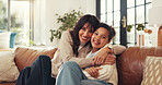 Portrait, hug and mom with child on sofa for bonding, relationship and support in living room. Family, parenting and happy mother with girl embrace in home for affection, care and love on weekend