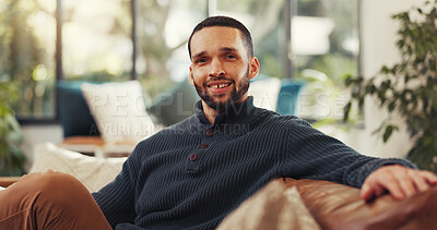 Buy stock photo Happy, portrait and man on sofa with pride, confidence and relaxing break on weekend getaway. Smile, positive attitude and person on couch for calm holiday, vacation and wellness in living room.