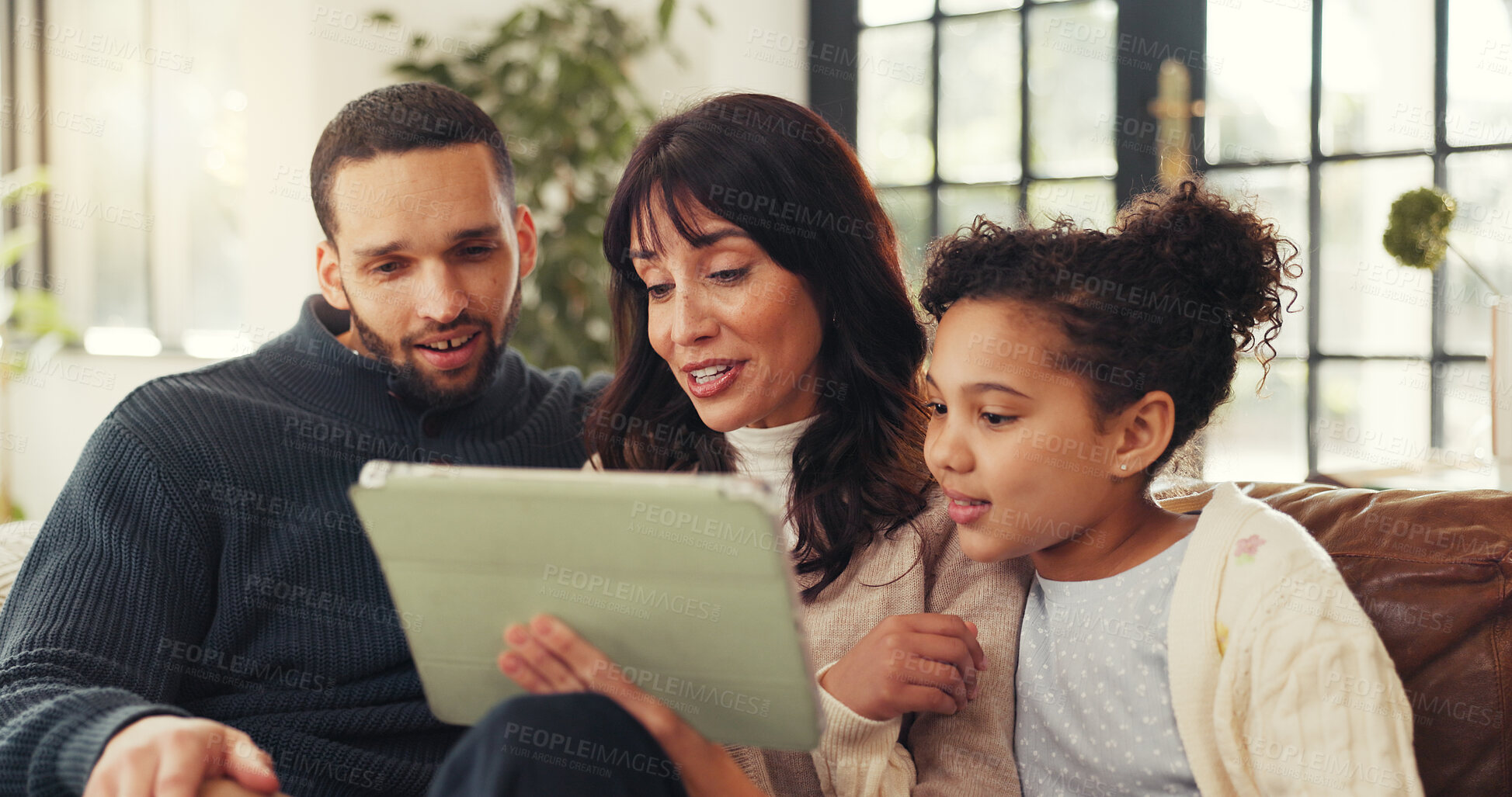 Buy stock photo Parents, girl and relax with tablet on sofa, smile and choice for film, bonding and streaming in lounge. Father, mother and daughter with love, tech or application for movies on couch at family house