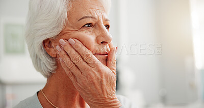 Buy stock photo Toothache, thinking and senior woman in home with hand on face for cavity or swollen gums. Memory, mouth inflammation and elderly female person in retirement with pressure for teeth pain in apartment