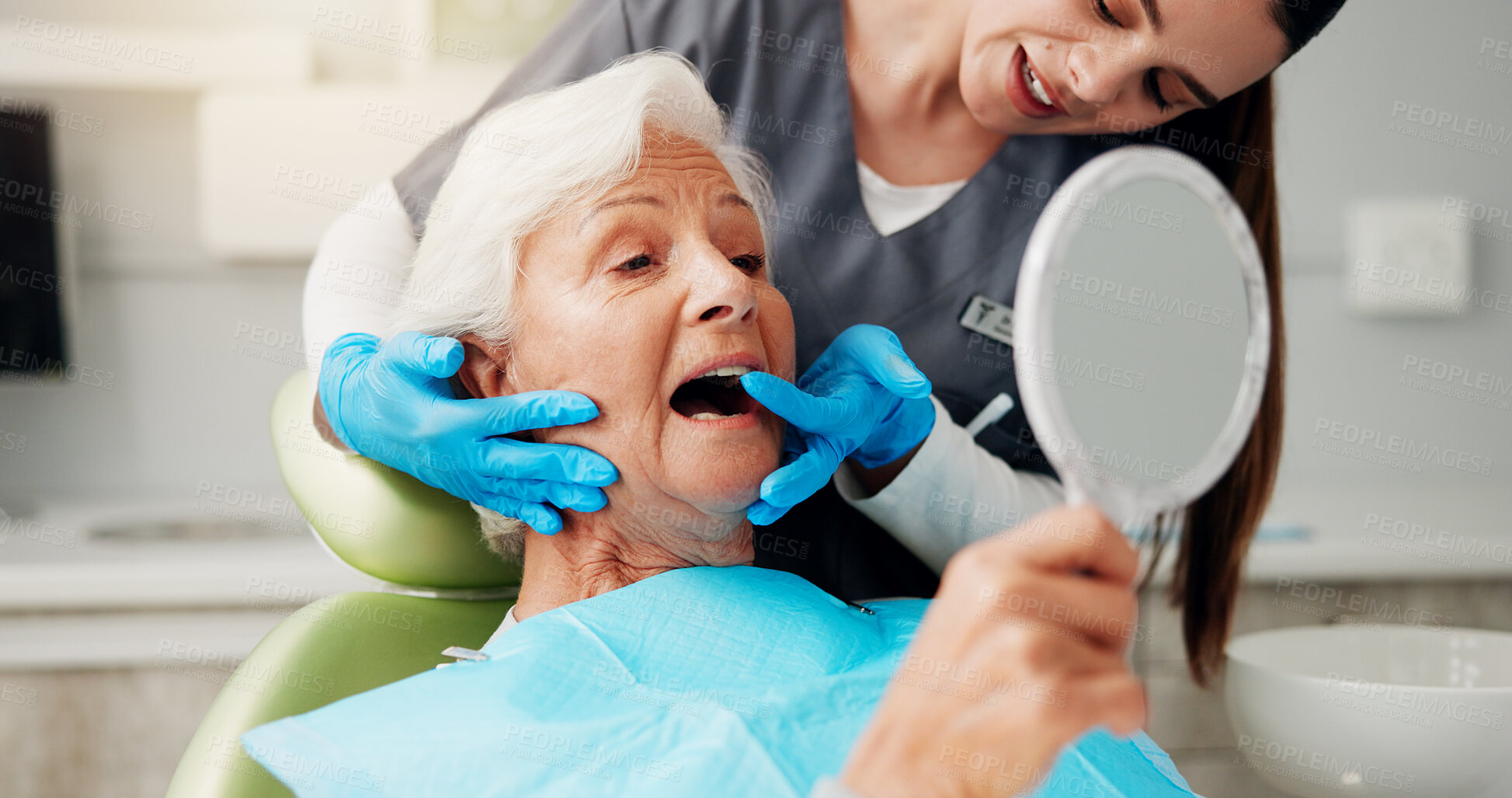 Buy stock photo Dentist, senior woman and consulting with mirror for teeth cleaning, dental implant or oral hygiene. Inspection, healthcare or doctor with old patient in clinic for mouth exam or root canal treatment