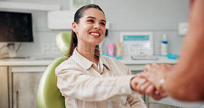 Buy stock photo Woman, holding hands and smile at dentist for oral hygiene, teeth whitening or healthcare checkup. Dental care, patient and support for cavity extraction, root canal service and help or advice