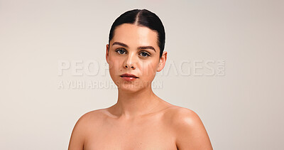 Buy stock photo Portrait, skincare and beauty with woman in studio for glow, shine or dermatology. Face, makeup and serious model with facial cosmetics for aesthetic, health or skin texture on white background space