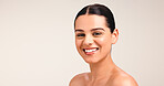 Skincare, smile and portrait of woman in studio for beauty, self care and collagen benefits. Happy, mockup space an dermatology with female person on white background for facial glow and aesthetic