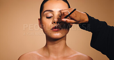 Buy stock photo Beauty, hand and woman with lipstick brush, makeup artist and cosmetics for facial shine. Space, glowing skincare and person with tool, lip gloss application and color product on studio background