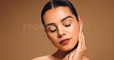 Buy stock photo Makeup, soft touch and beauty of woman on a brown background for cosmetics and foundation. Eyelashes, skin glow and radiant face of model in studio with mockup space, brows and benefits of facial