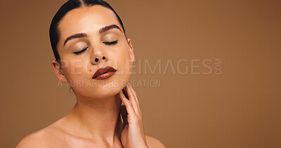 Buy stock photo Skincare, eyes closed and woman in studio, beauty and dermatology on brown background. Shine, mockup space and person with glow, wellness and cosmetics with confidence, aesthetic and grooming