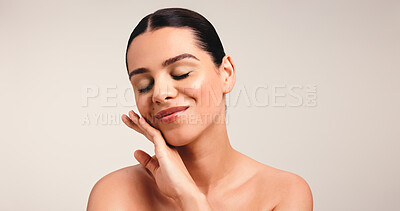 Buy stock photo Happy, woman and skincare with touch in studio for clear skin, natural glow and smooth textures. Mockup space, person and facial shine of dermatology cosmetics, treatment results and white background