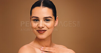 Buy stock photo Cosmetology, happy and woman with makeup in studio, beauty salon or skin routine for flawless face. Skincare, self care and smiling person with space, portrait or facial treatment on brown background