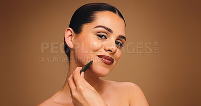 Buy stock photo Woman, gua sha and beauty portrait in studio, lymphatic drainage or antiaging skincare. Mockup space, person and jade stone for dermatology, natural cosmetic care and facial massage on background