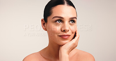 Buy stock photo Thinking, cosmetics and woman in studio, beauty and dermatology on white background. Mockup space, shine and person with healthy skin, grooming and skincare with glow, wellness and aesthetic