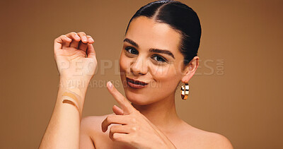 Buy stock photo Woman, arm and foundation swatch with makeup for beauty in studio, color choice or point for cosmetics. Person, show concealer or decision for contour, blending portrait and cosmetology on background