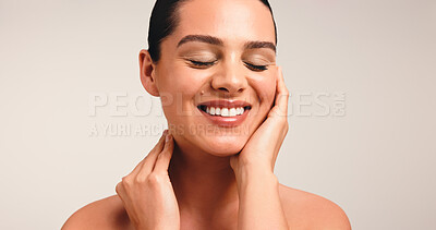 Buy stock photo Skincare, smile and glow with woman in studio for beauty, self care and collagen benefits. Happy, mockup space an dermatology with female person on white background for facial shine and aesthetic